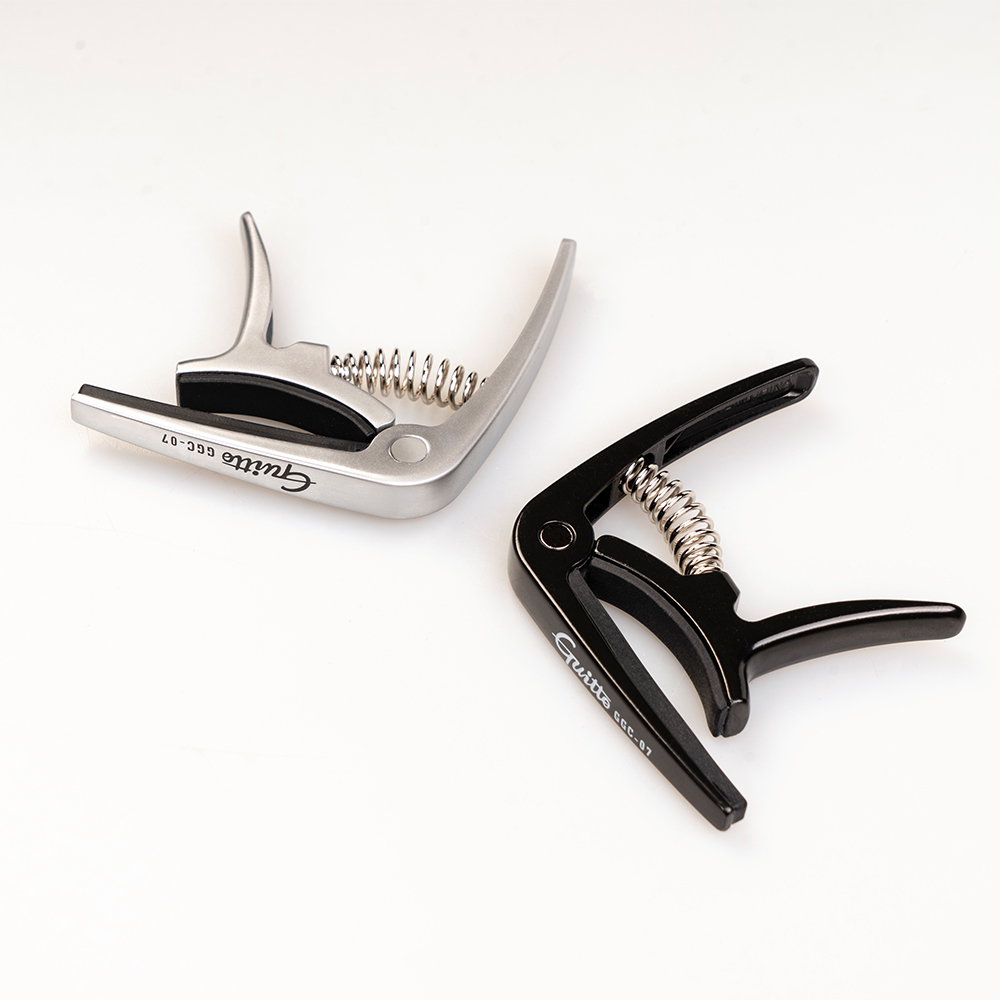 GUITTO GGC-07 Ukulele Capo Qui - đánh giá và giá Musical Instrument Note